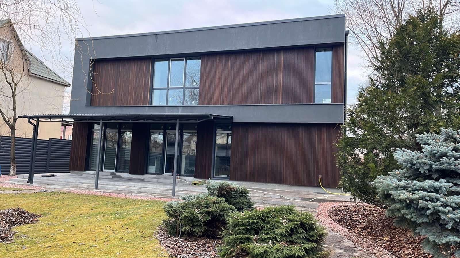 Thermally modified ash façade used in a commercial office project. The material was selected for its dimensional stability, durability, and clean architectural appearance in exterior applications.